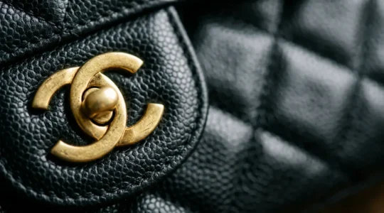 Close-up detail of authentic vintage Chanel bag showing craftsmanship and hardware